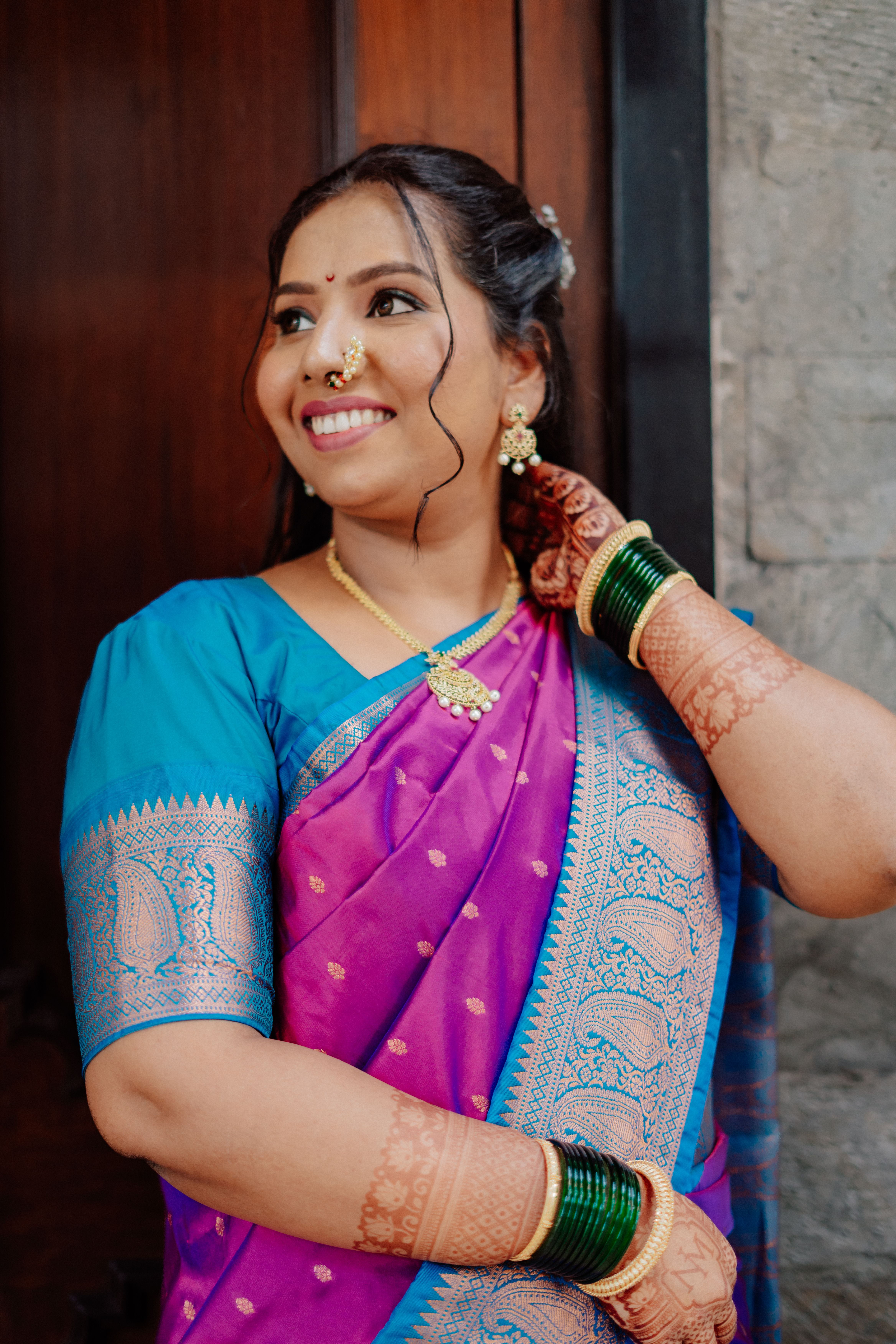 Elegant Woman in Traditional Indian Saree Smiling · Free Stock Photo
