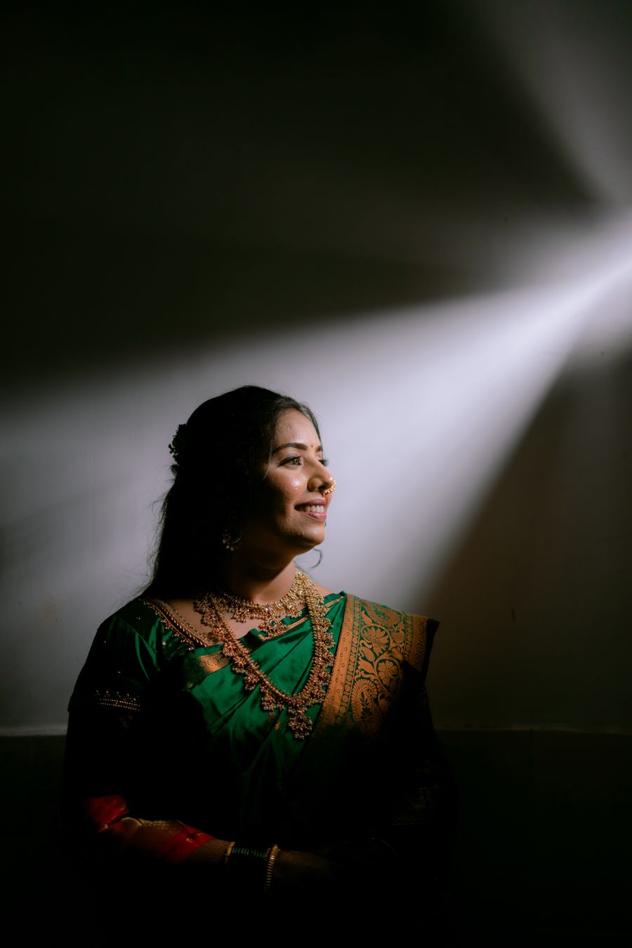 Portrait in traditional attire with dramatic lighting
