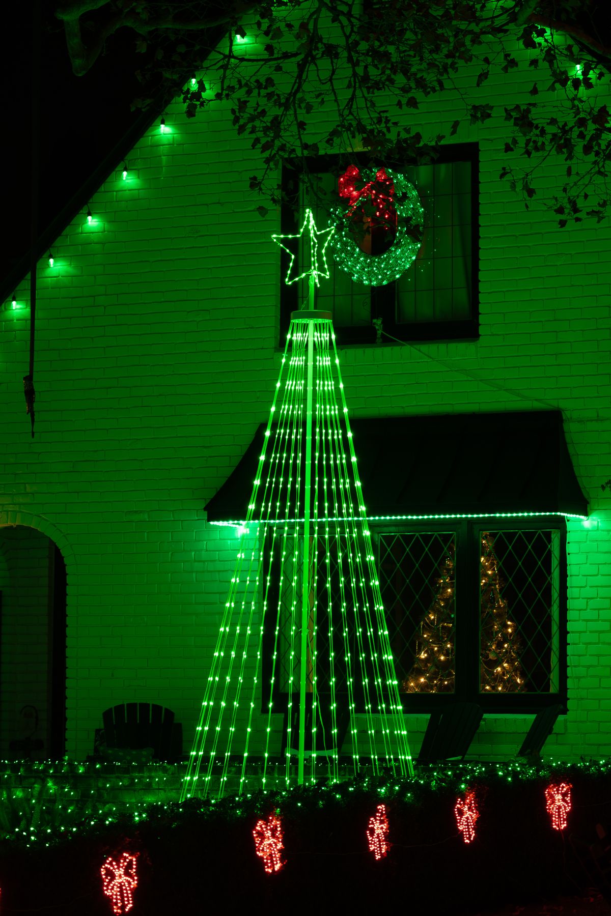 House exterior decorated with professional Christmas lights
