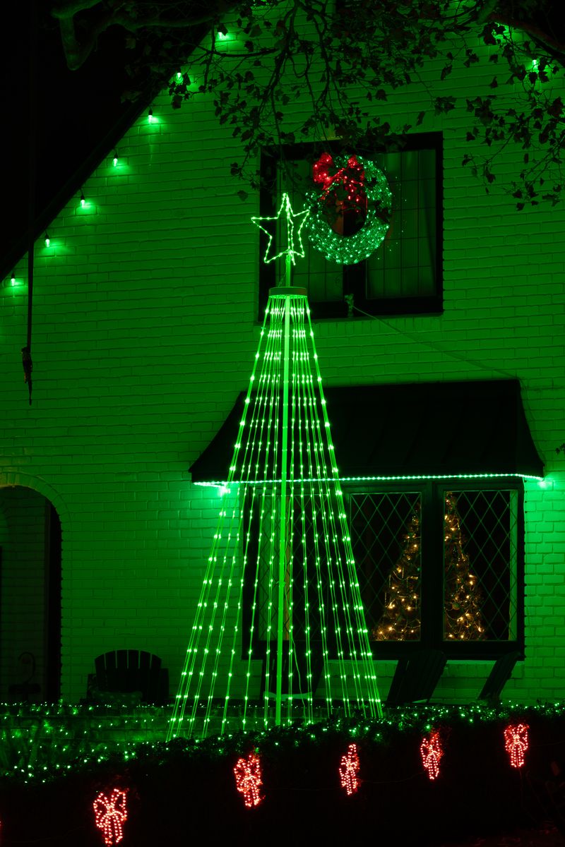 Illustrative stock photo of a home decorated with holiday lights