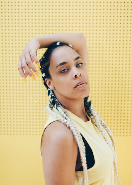 Woman Wearing Yellow Sleeveless Top