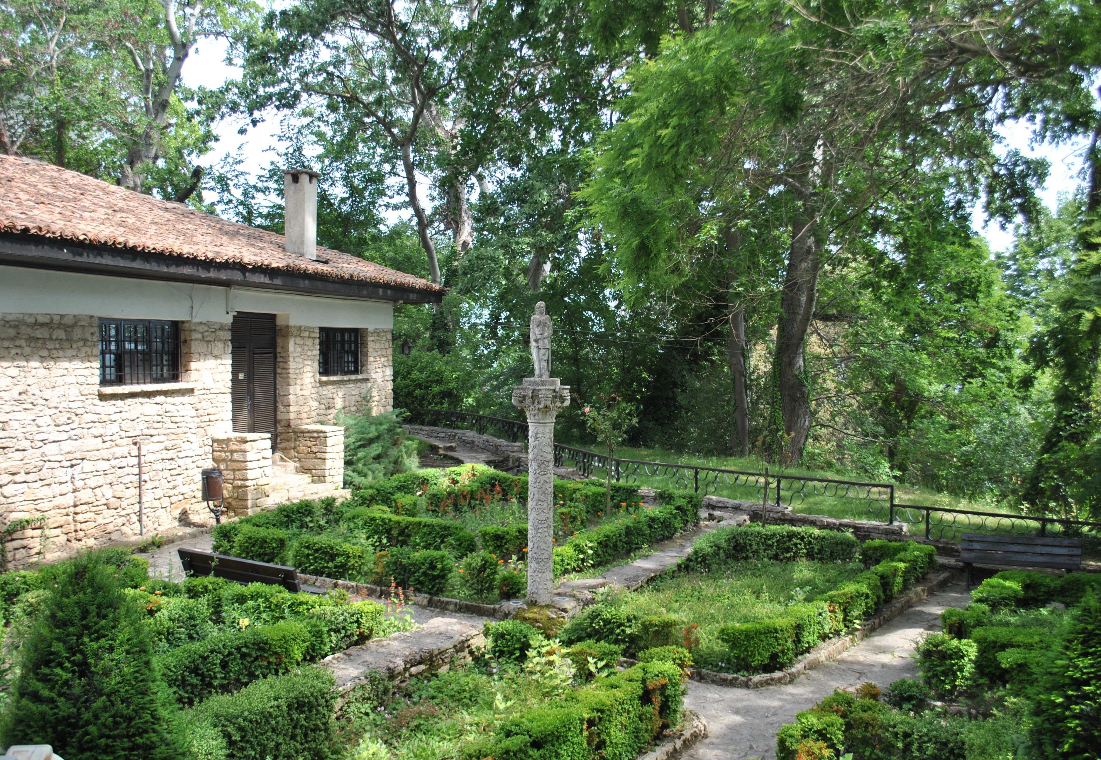 Charming Stone House with Lush Green Garden · Free Stock Photo