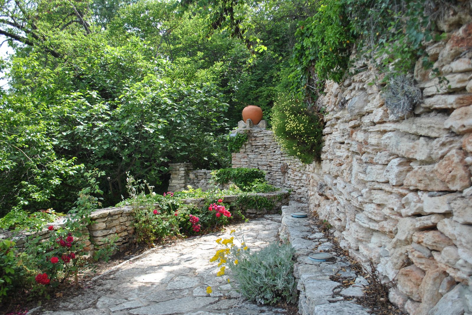 Garden path between stone walls