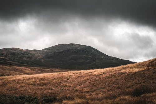 Free Brown Mountain And Gray Clouds Stock Photo