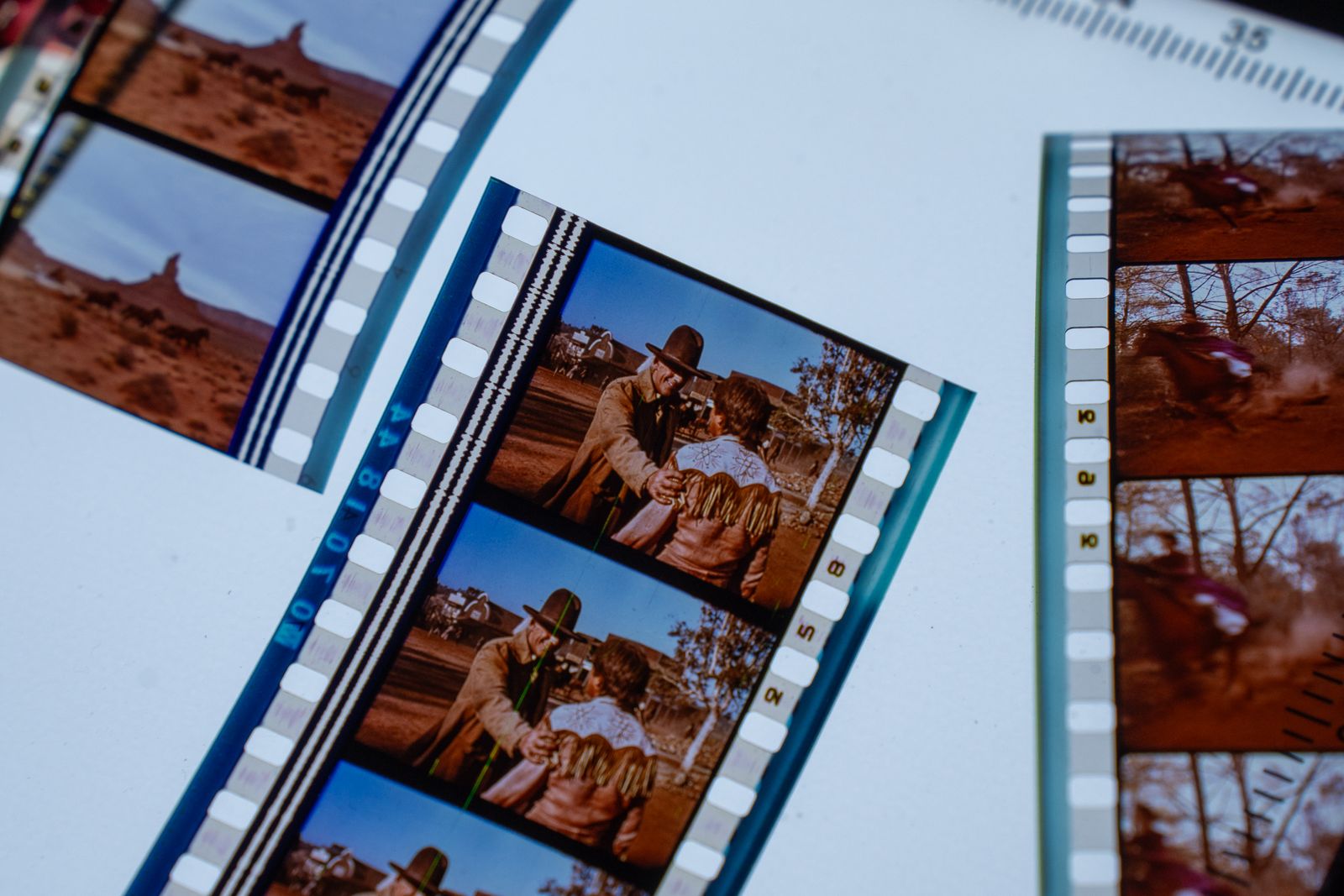 Vintage filmstrips laid out as archival material. Not an official still from any featured film.