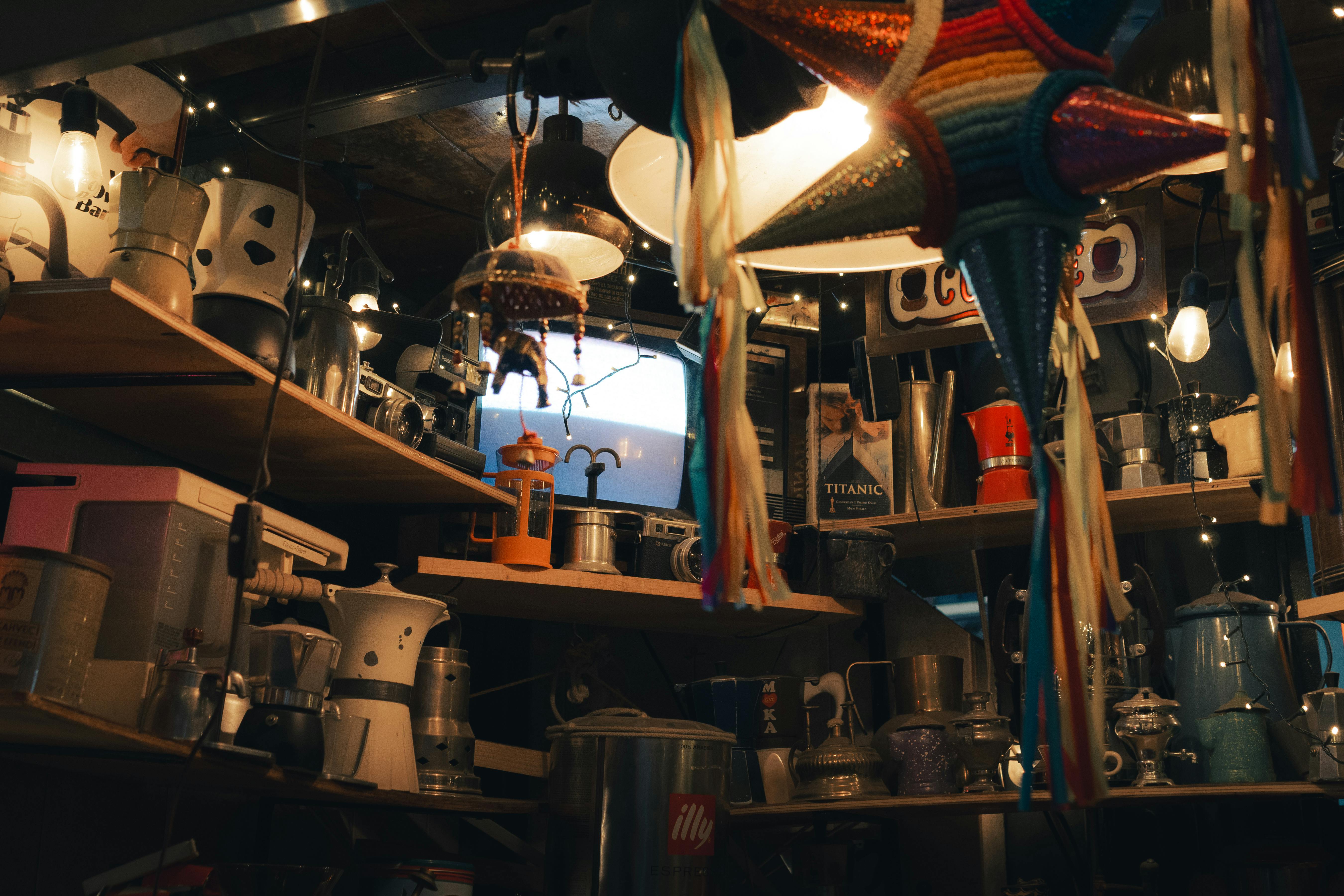 A charming vintage cafe filled with eclectic decor, warm lighting, and cozy corners.