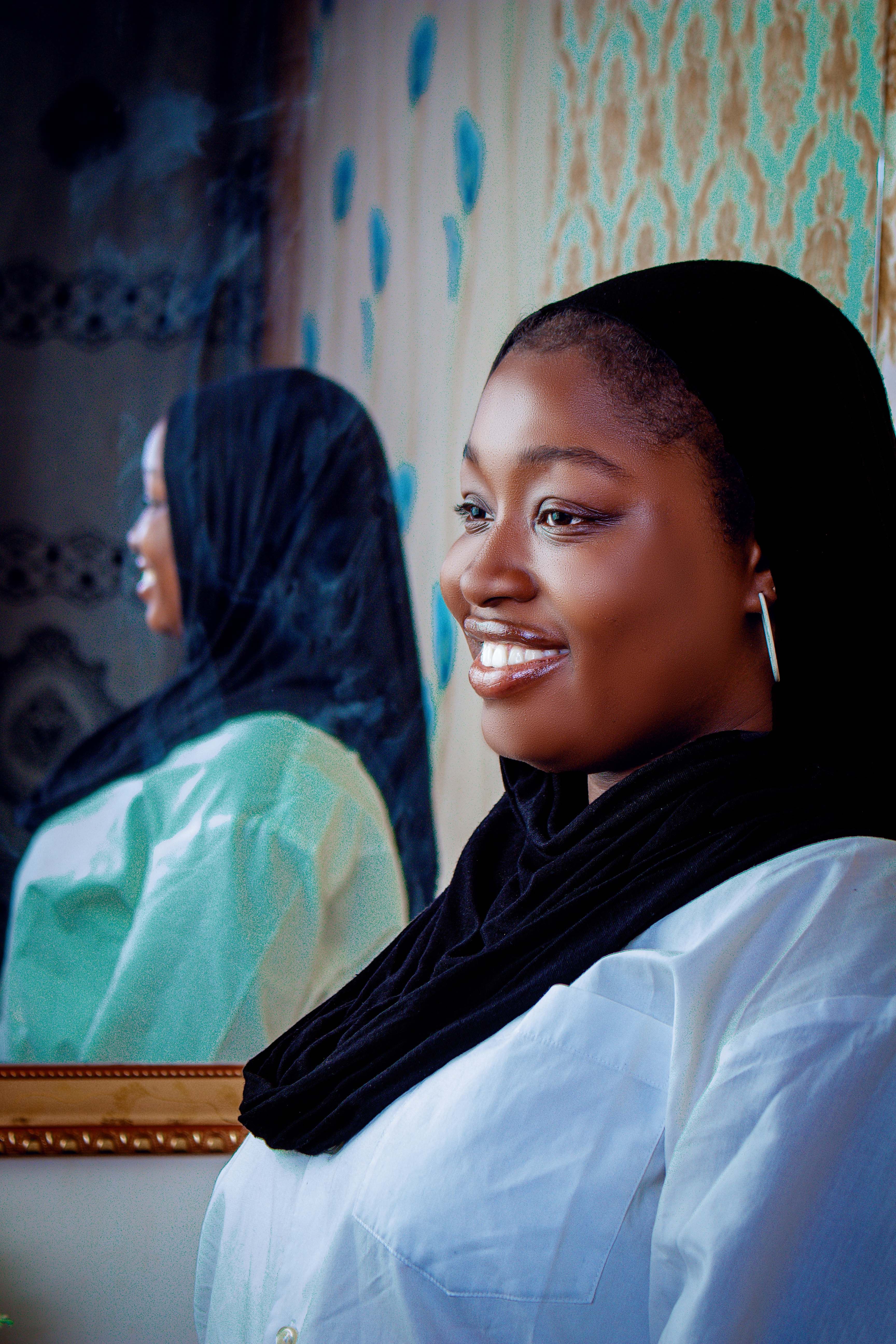 Portrait of a Woman Smiling in a Hijab · Free Stock Photo