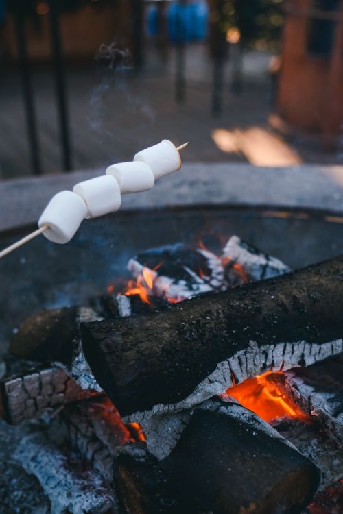 Free Close-up of marshmallows roasting over an outdoor campfire in Kyiv, Ukraine. Stock Photo