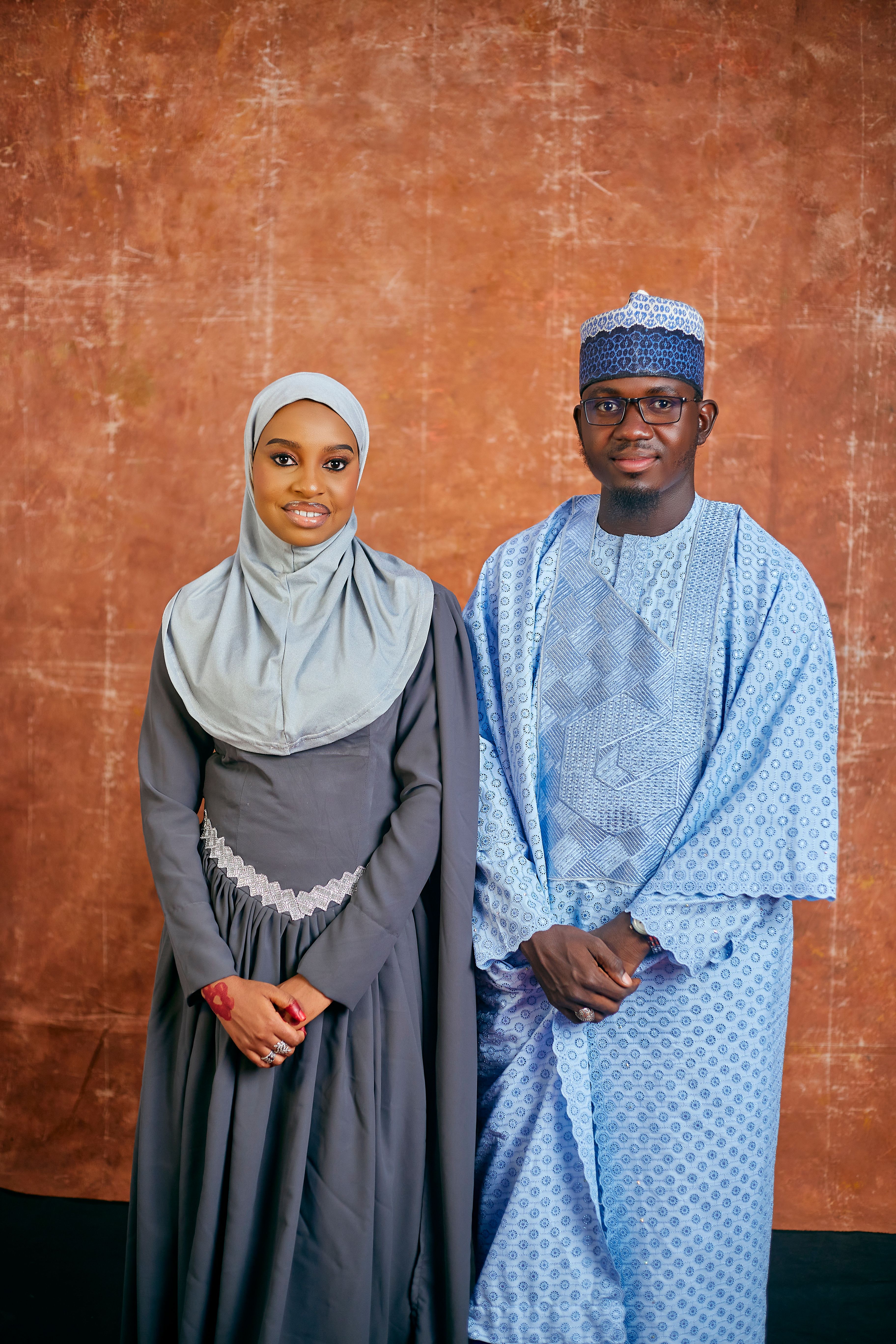 Graduation Portrait of Two Adults in Traditional Attire · Free Stock Photo
