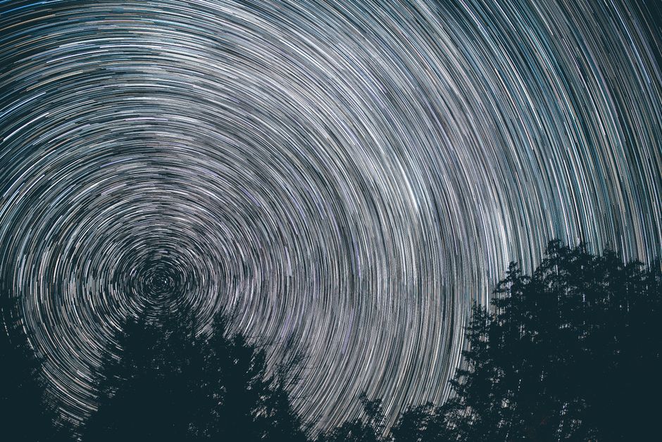 A sequence of 100 individual star photos being layered together to create a seamless star trail composite - star trails A sequence of 100 individual star photos being layered together to create a seamless star trail composite - star trails