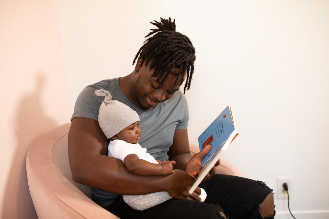 Free Photo Of Man Carrying Baby Stock Photo