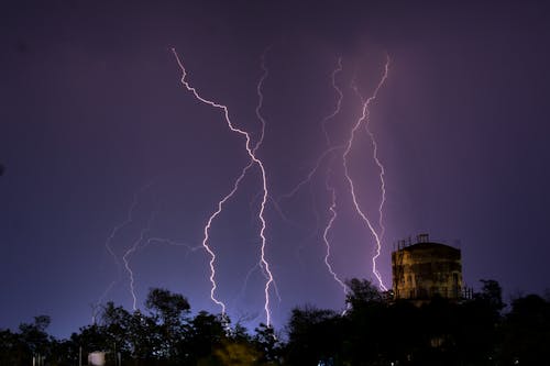 Free Lightning over Trees Stock Photo