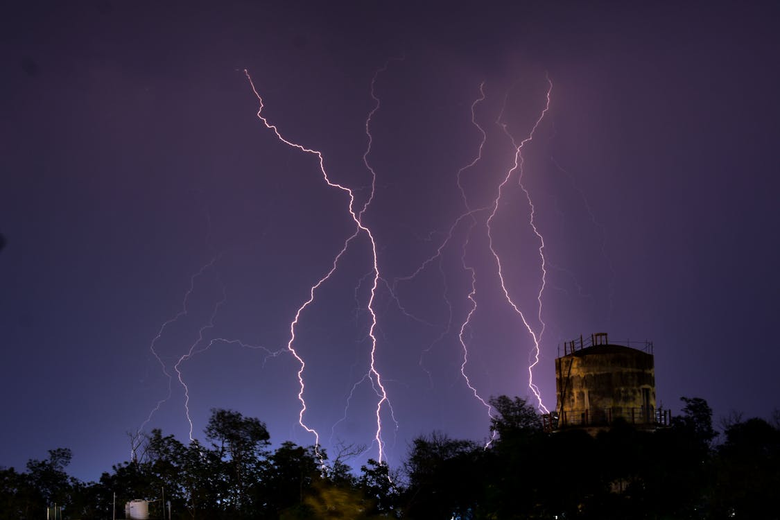Free Lightning over Trees Stock Photo
