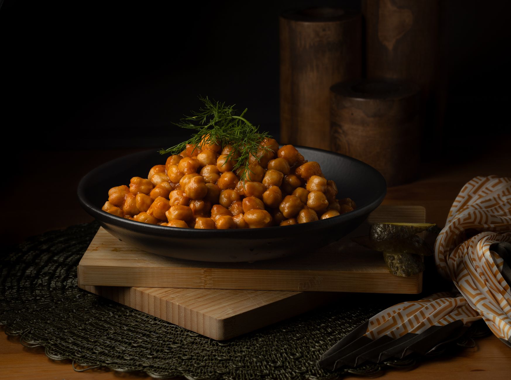 Quick and Tasty Vegan Sweet Potato Chickpea Taco Salad A bowl of spiced chickpeas garnished with fresh herbs, perfect for a healthy meal.