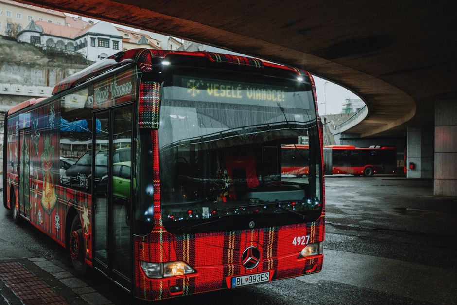 Slovak Lines intercity bus traveling through a scenic road in Slovakia