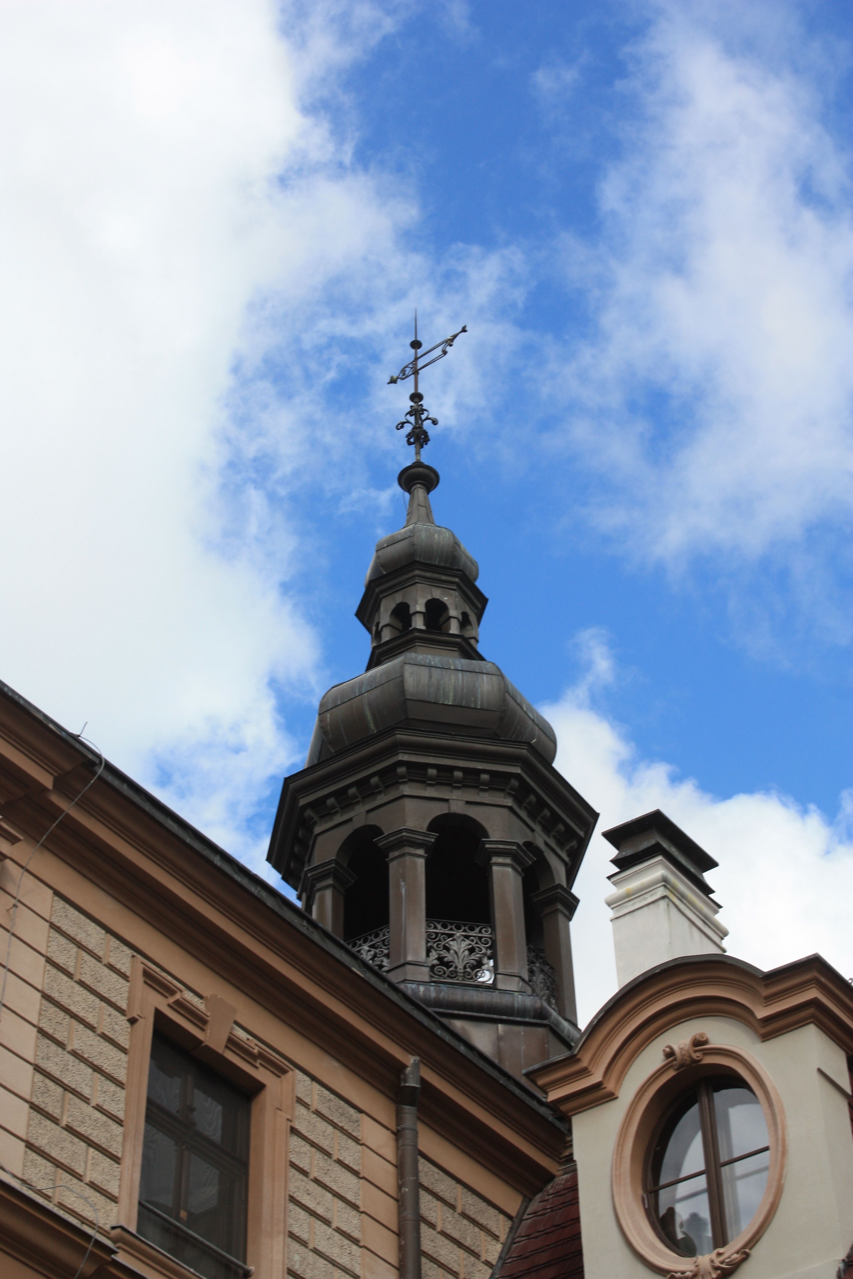 Historic European Architecture with Steeple Against Sky · Free Stock Photo