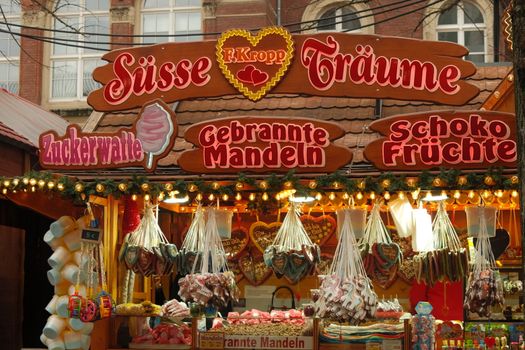 Traditional German market stall with sweets and treats. Perfect for holiday and cultural themes.