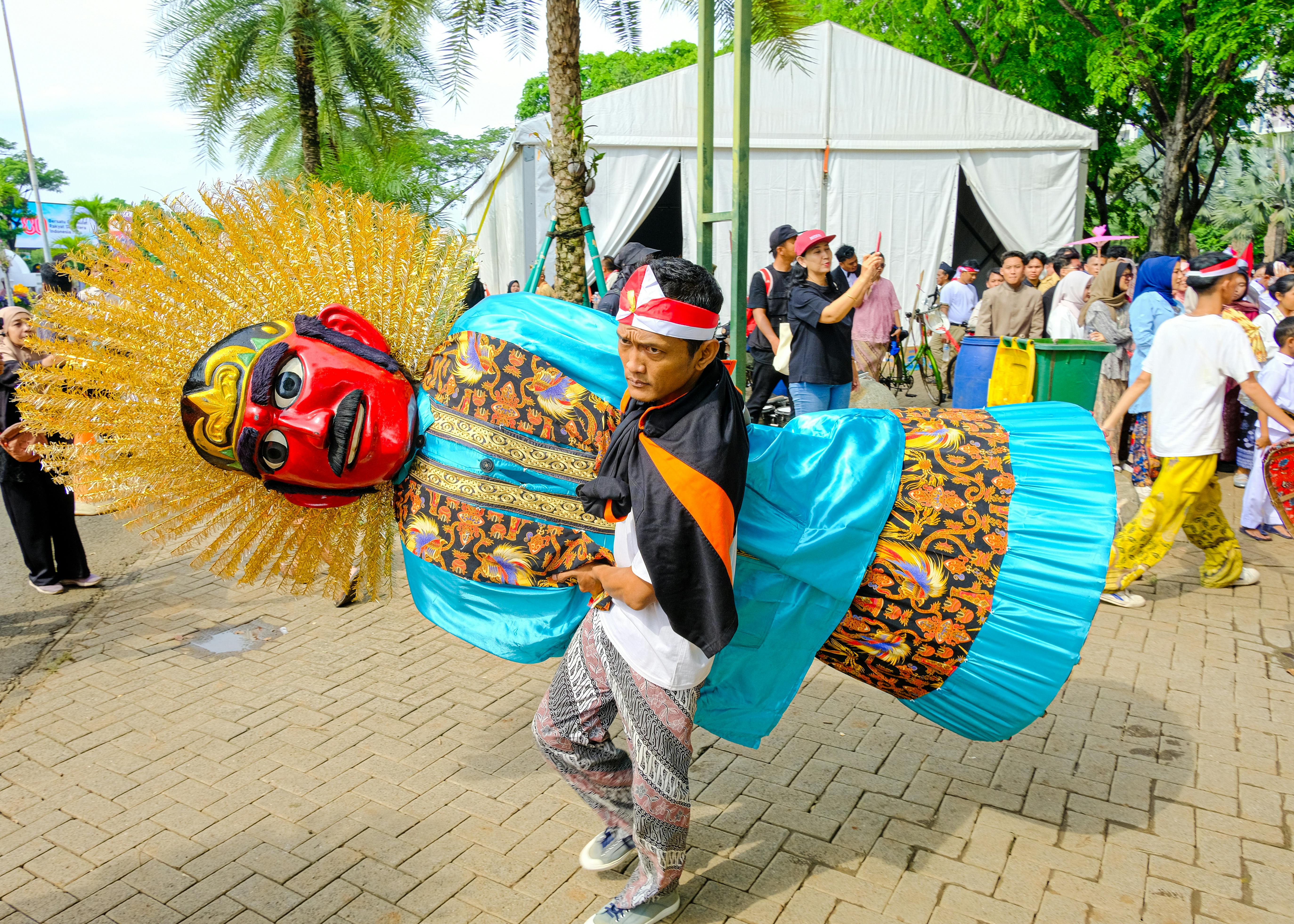 Cultural celebration with Ondel-Ondel figures in Jakarta, Indonesia. - Yakarta
