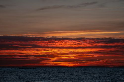 Free A stunning sunrise over the ocean with vivid colors in Stamford, Connecticut. Stock Photo