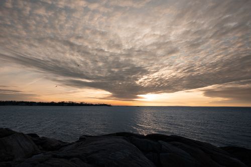 Free Dramatic sunrise landscape at Cove Island Park, Stamford, with vibrant skies over the water. Stock Photo