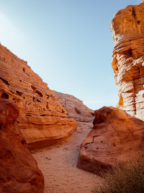 Free Explore the breathtaking formations of a red rock canyon under a clear sky. Stock Photo