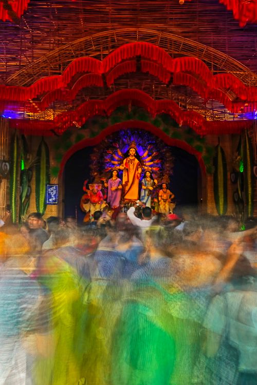 Free Blurred motion captures the festive spirit during Durga Puja in Kolkata, India. Stock Photo