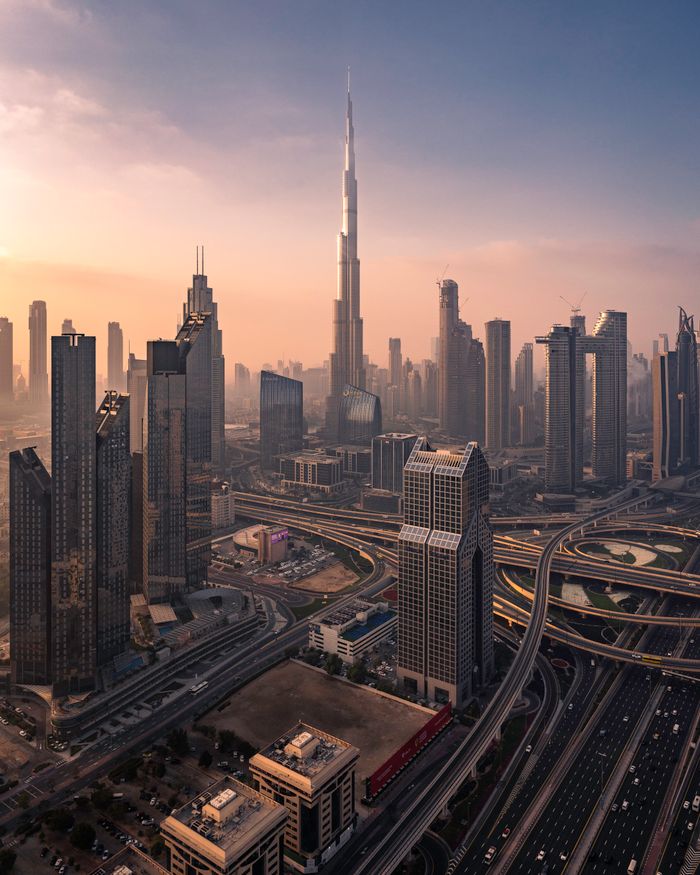Aerial view of the Dubai skyline and Burj Khalifa at golden hour