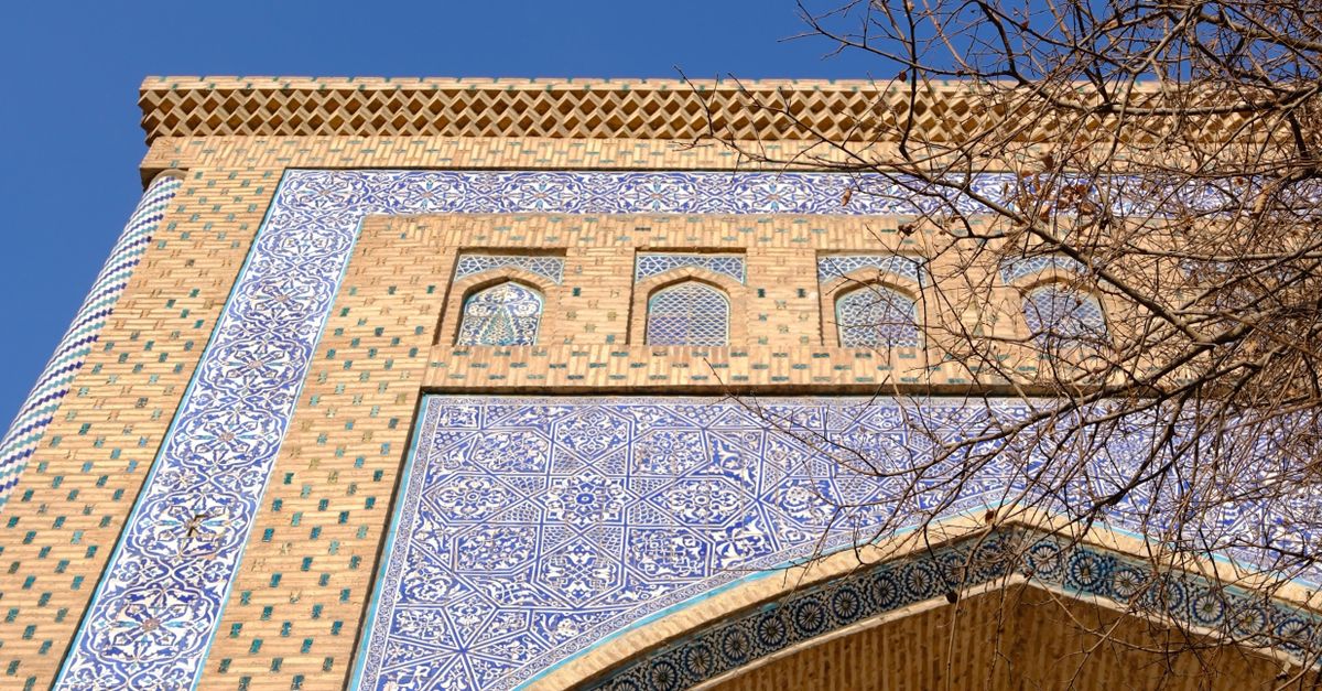 Islamic Tile Building Stunning Islamic Architecture with Intricate Tilework · Free Stock Photo