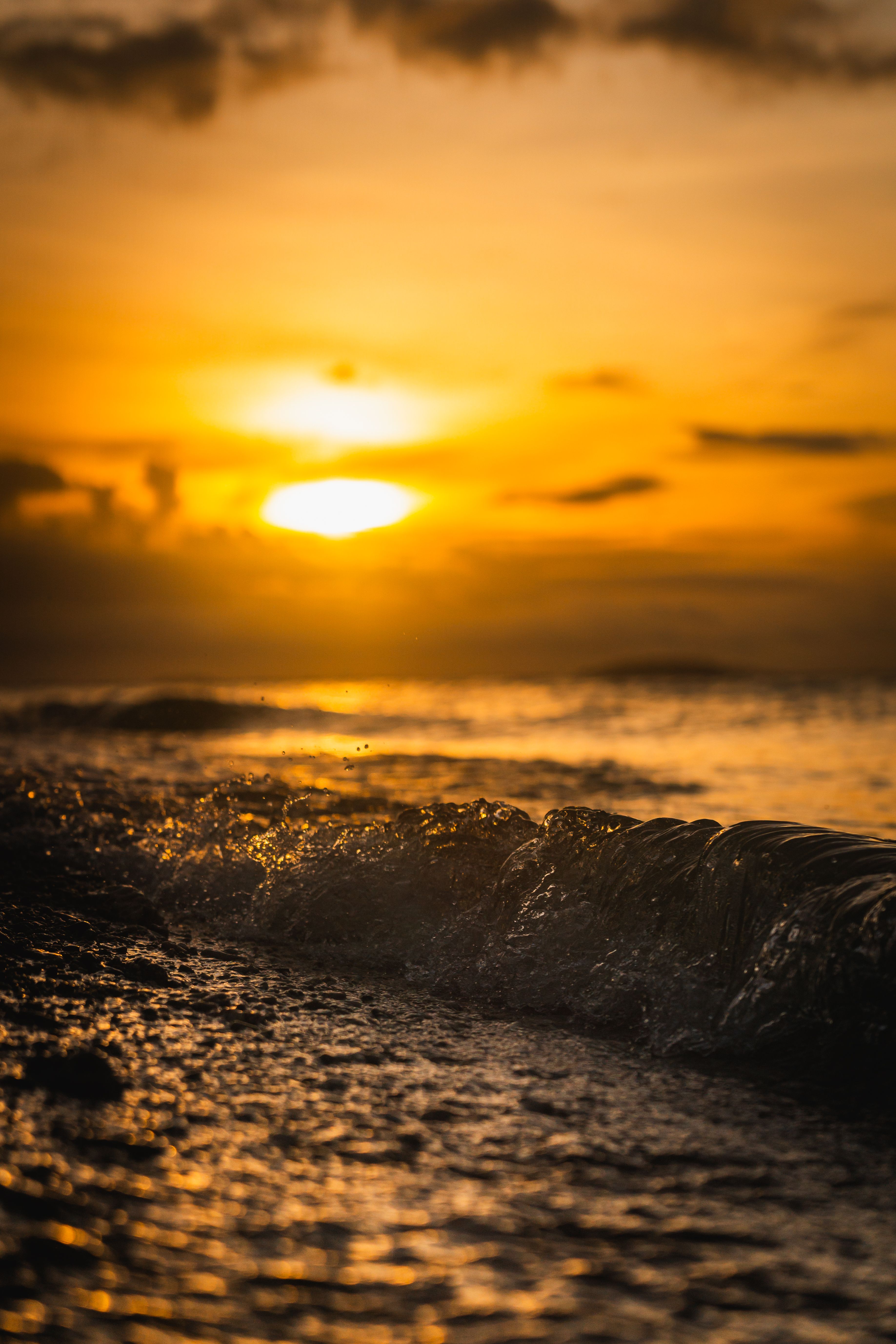 Golden Sunset Over Ocean Waves · Free Stock Photo