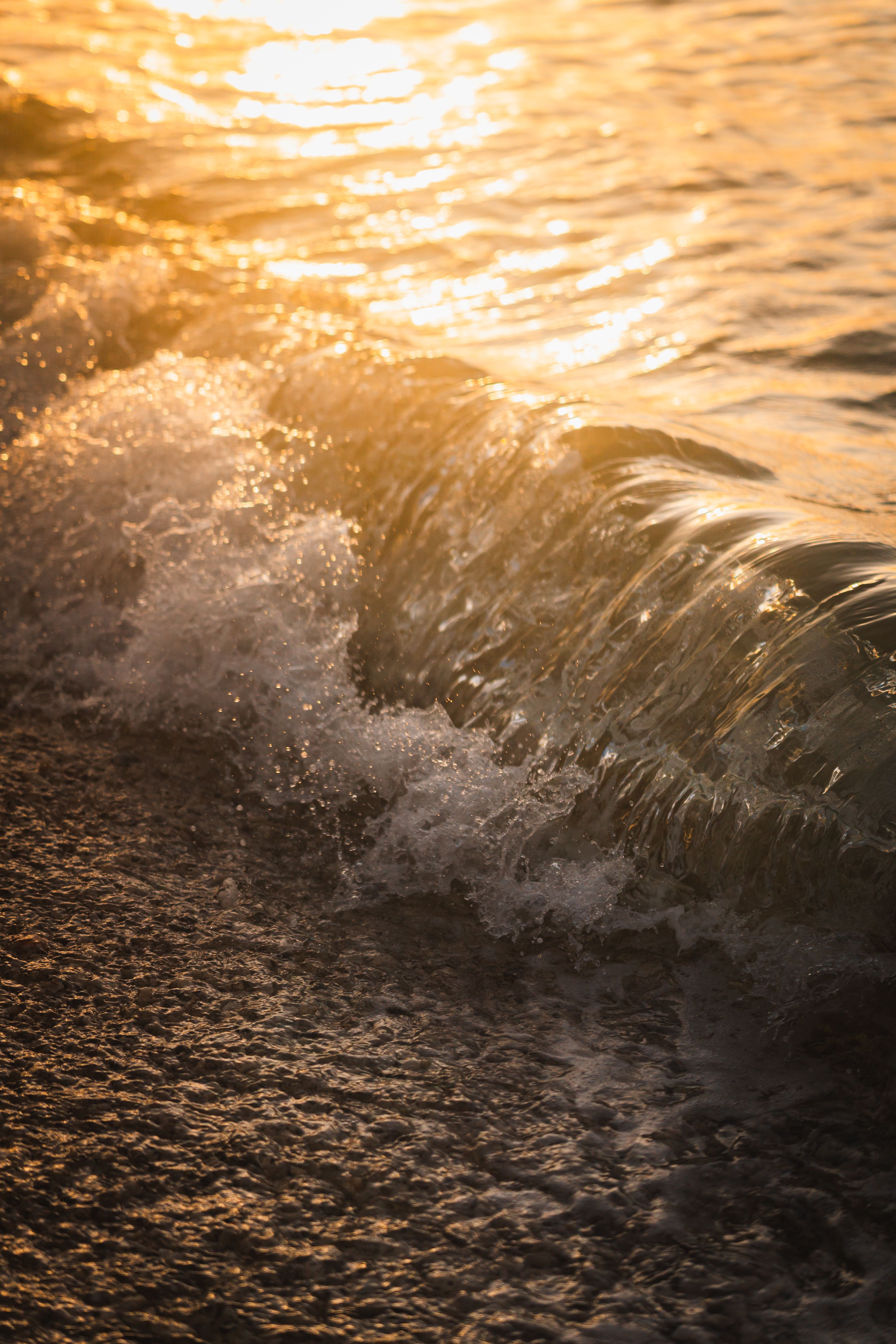 Golden Sunset Waves Crashing on Beach Shore · Free Stock Photo
