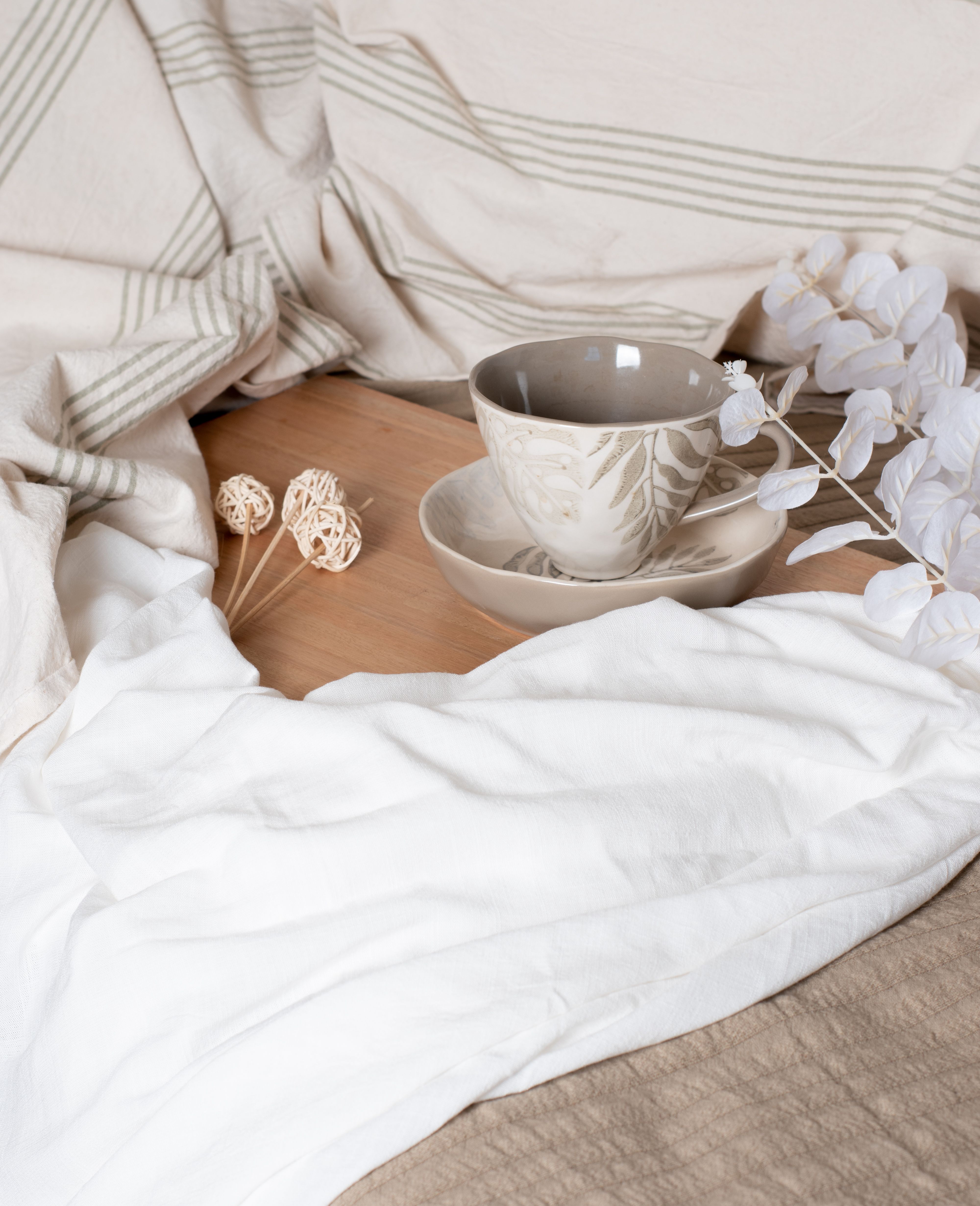 Cozy Morning Tea Setup with Cloaked Cup · Free Stock Photo