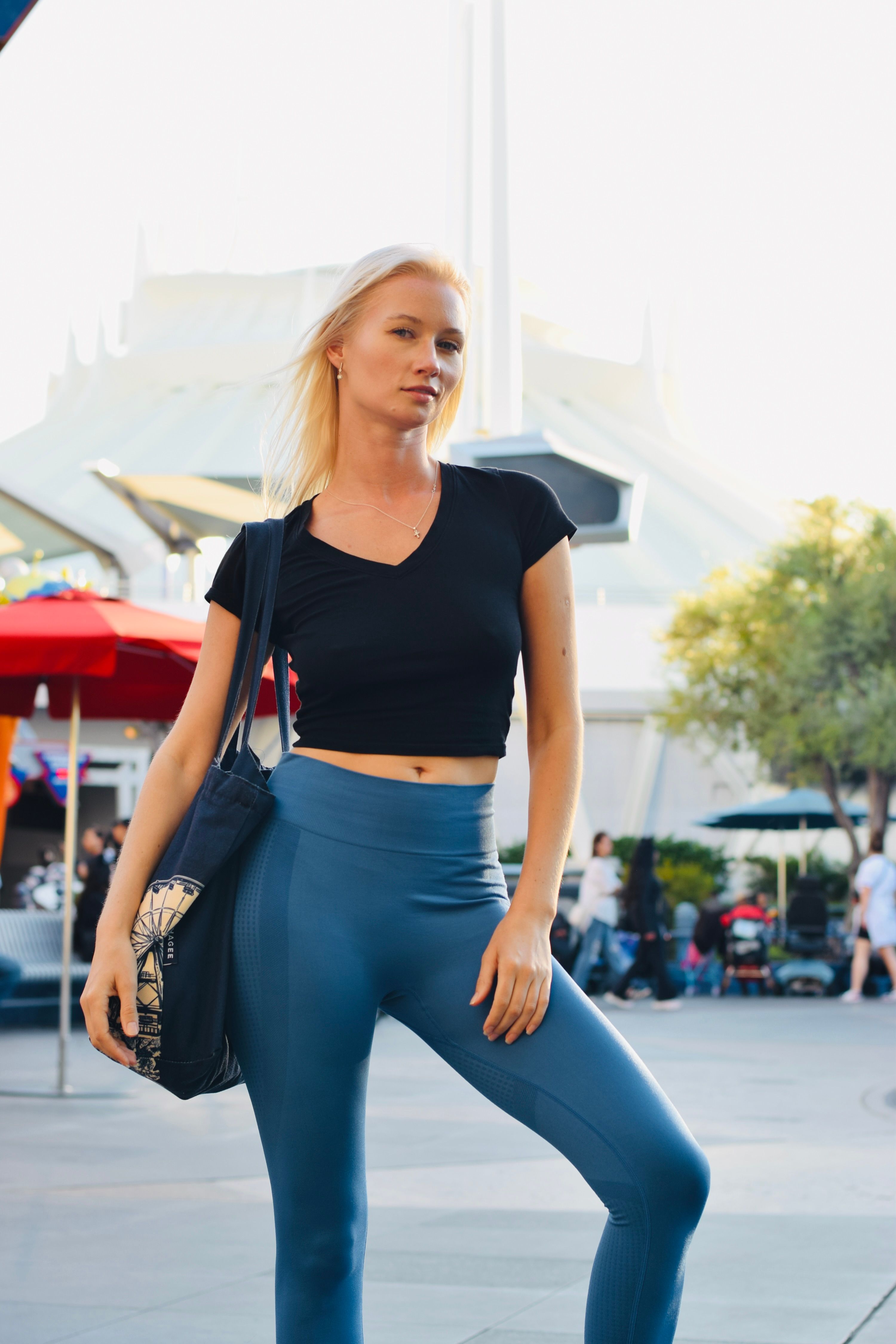 Stylish Woman Posing Outdoors in Urban Setting · Free Stock Photo