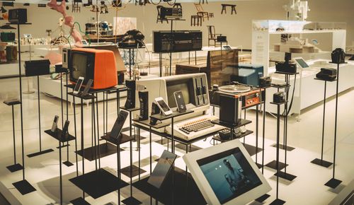 Free Showcase of vintage electronics in a modern museum setting. Stock Photo