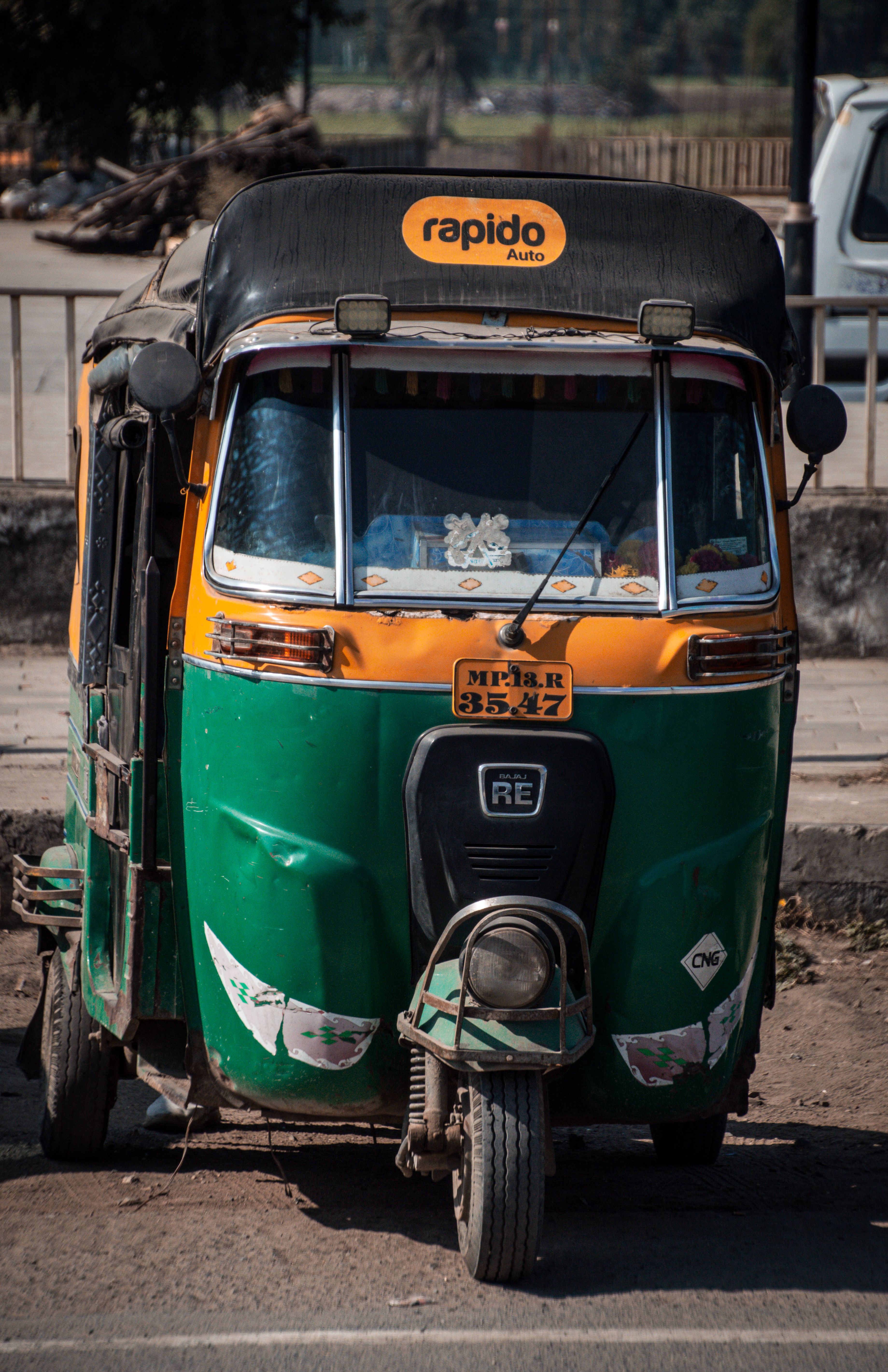 Colorful Indian Auto Rickshaw Parked Outdoors · Free Stock Photo