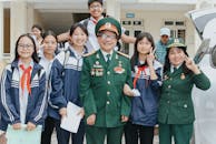 Group of Students with Military Veterans on School Visit