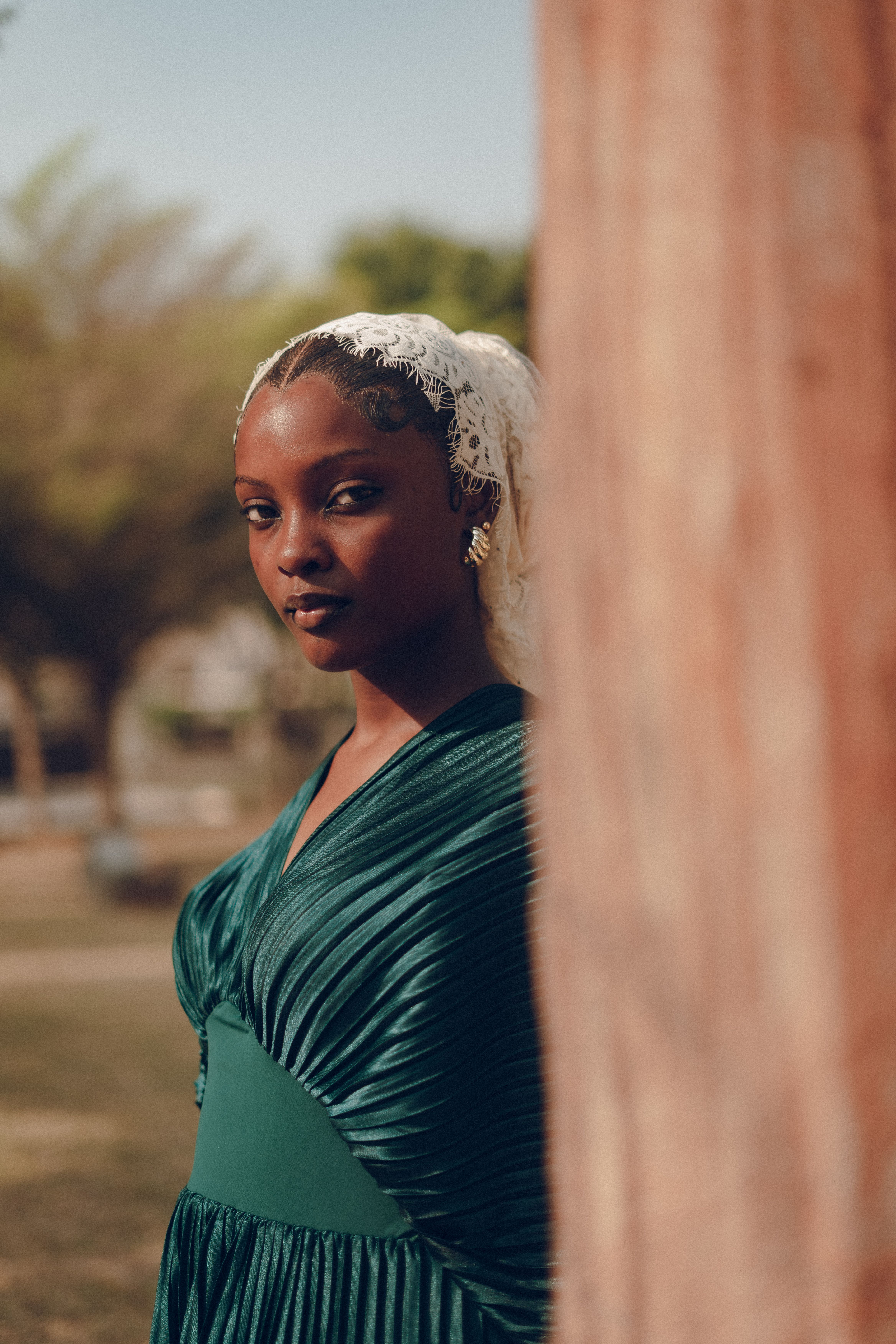 Elegant Portrait of Woman in Green Dress Outdoors · Free Stock Photo