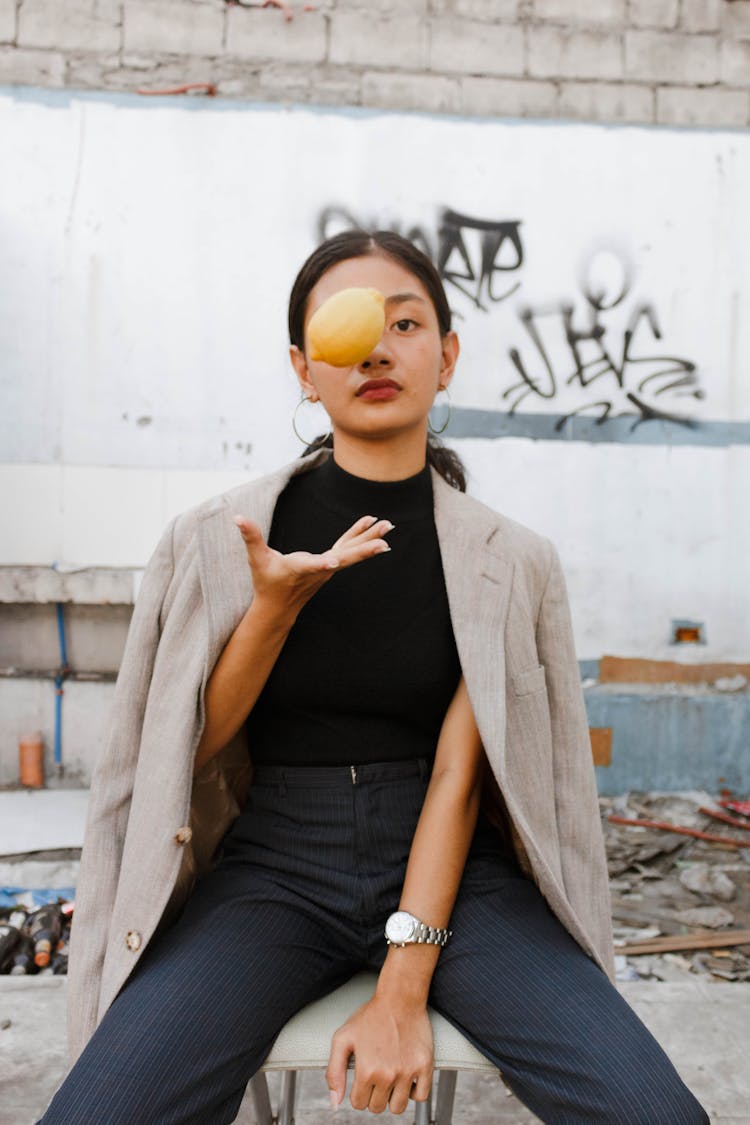 Woman Catching A Lemon