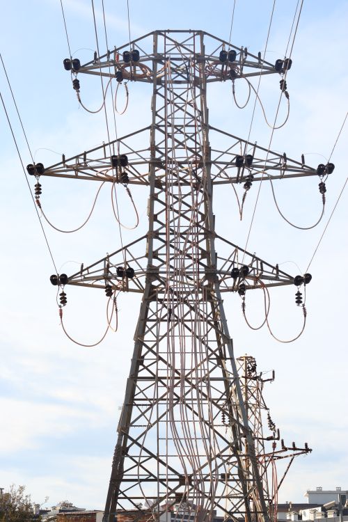 High Voltage Transmission Tower Against Blue Sky · Free Stock Photo