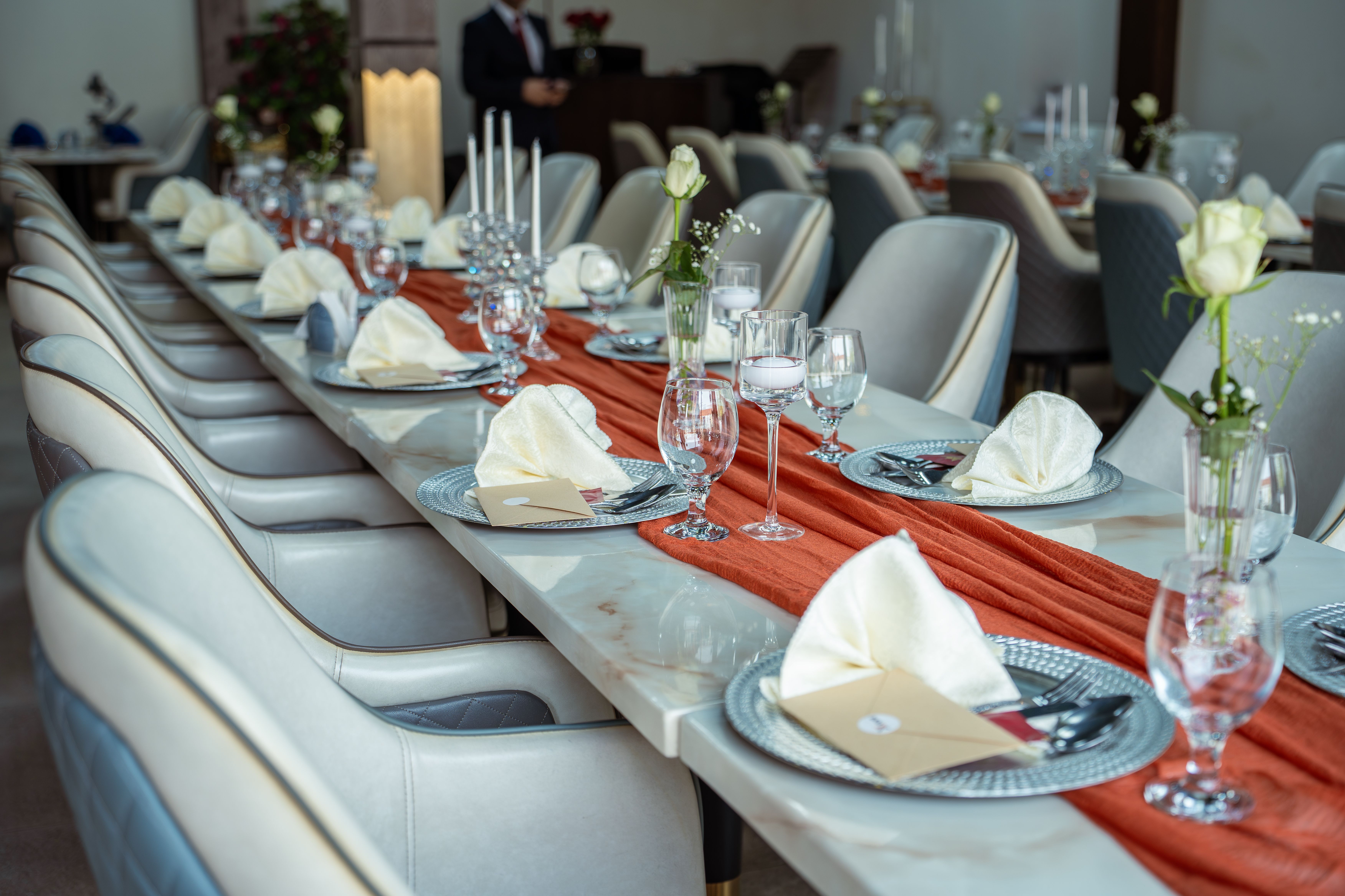 Chic and sophisticated table setting in a high-end Dubai restaurant featuring elegant decor and fine