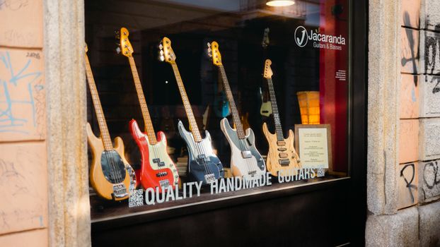 Storefront showcasing quality handmade guitars at Jacaranda Guitars & Basses shop.