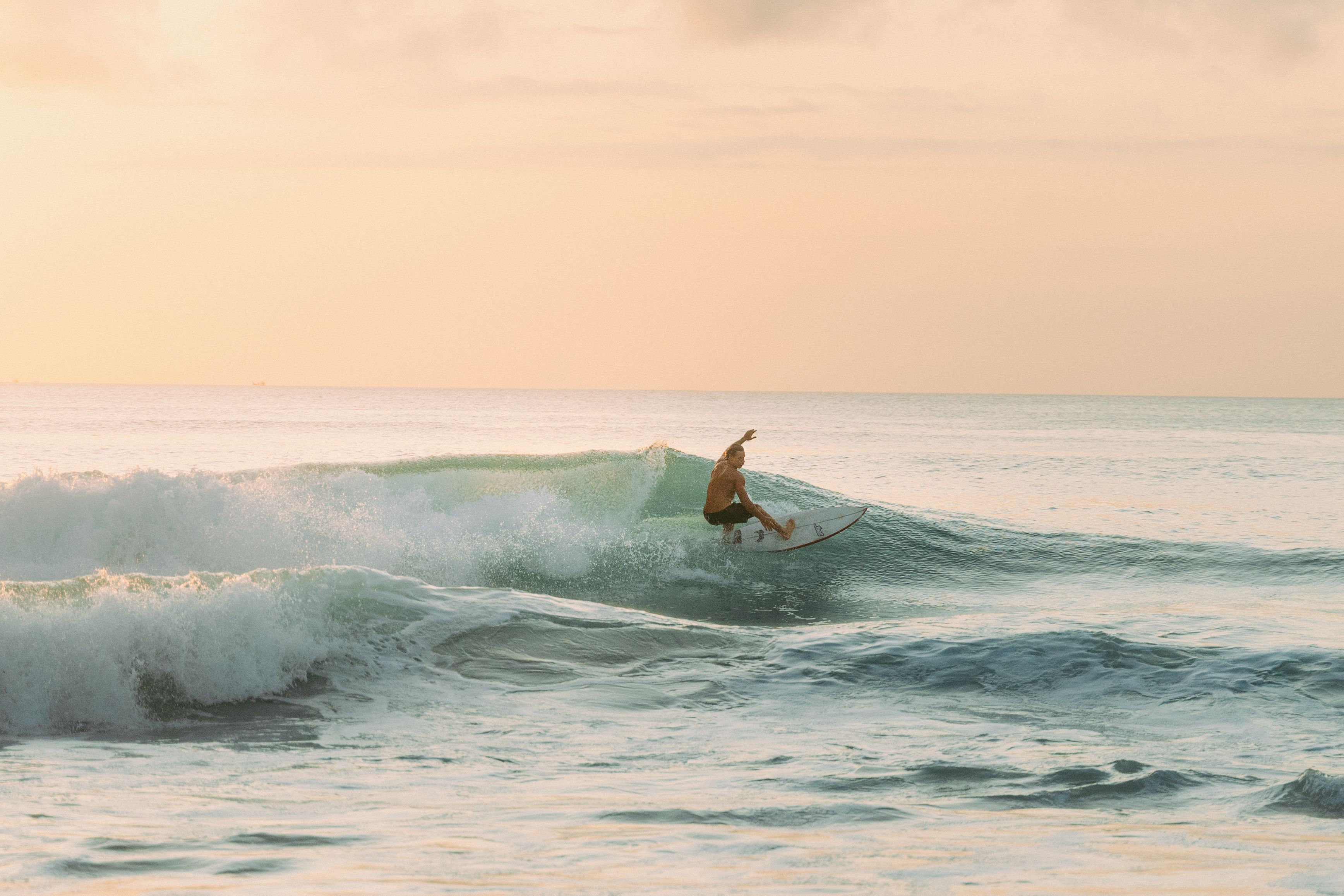 Canggu surf beach versus Ubud rice-terrace ridge, the two budget bases compared