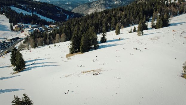 A breathtaking aerial view of a snowy forest landscape in Feldberg, Germany.