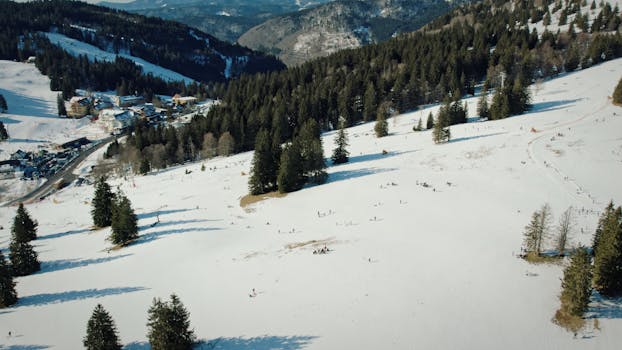 Breathtaking aerial view of a snowy landscape at Feldberg, Baden-Württemberg.
