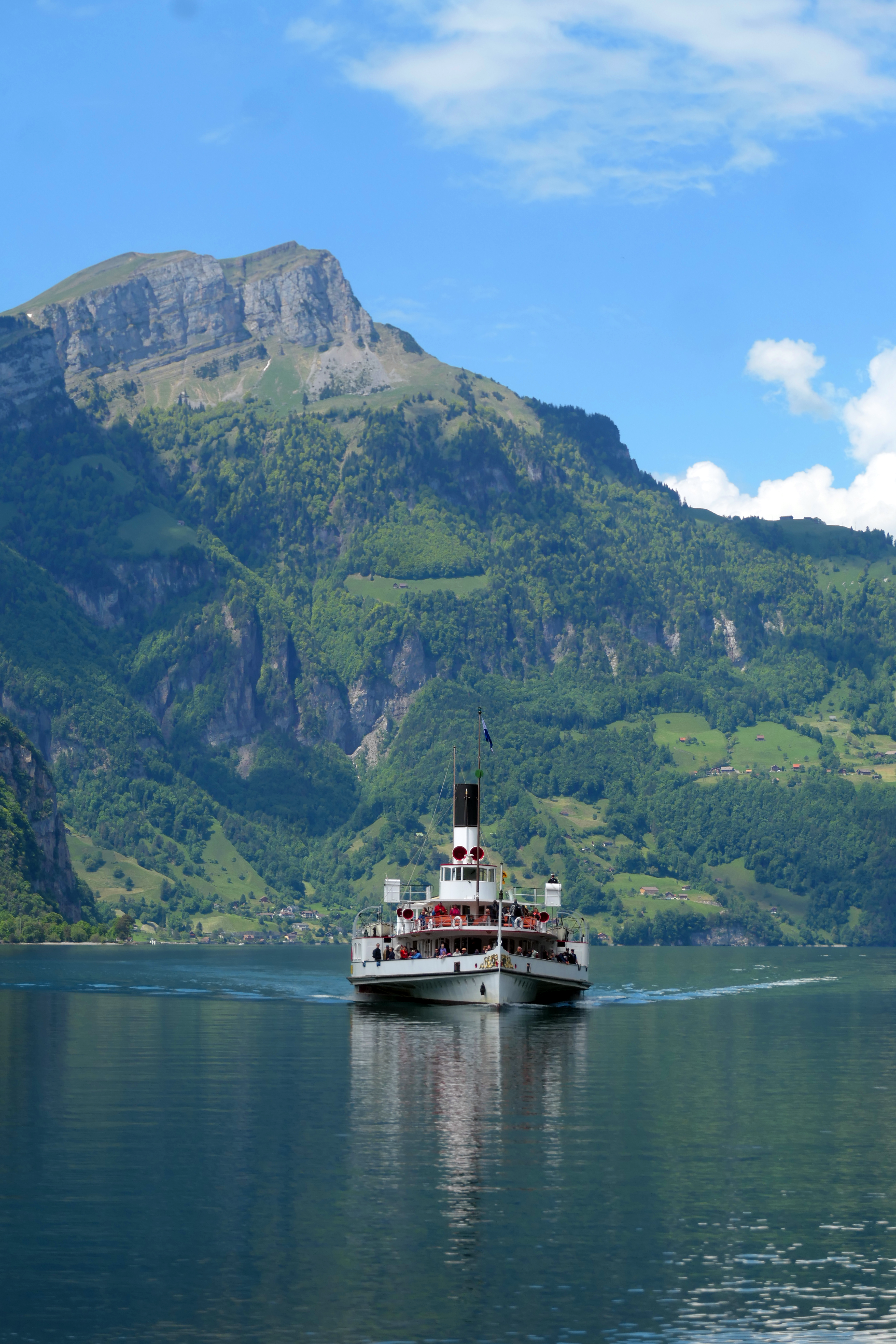 Scenic Lake Boat Ride in Flüelen, Switzerland · Free Stock Photo
