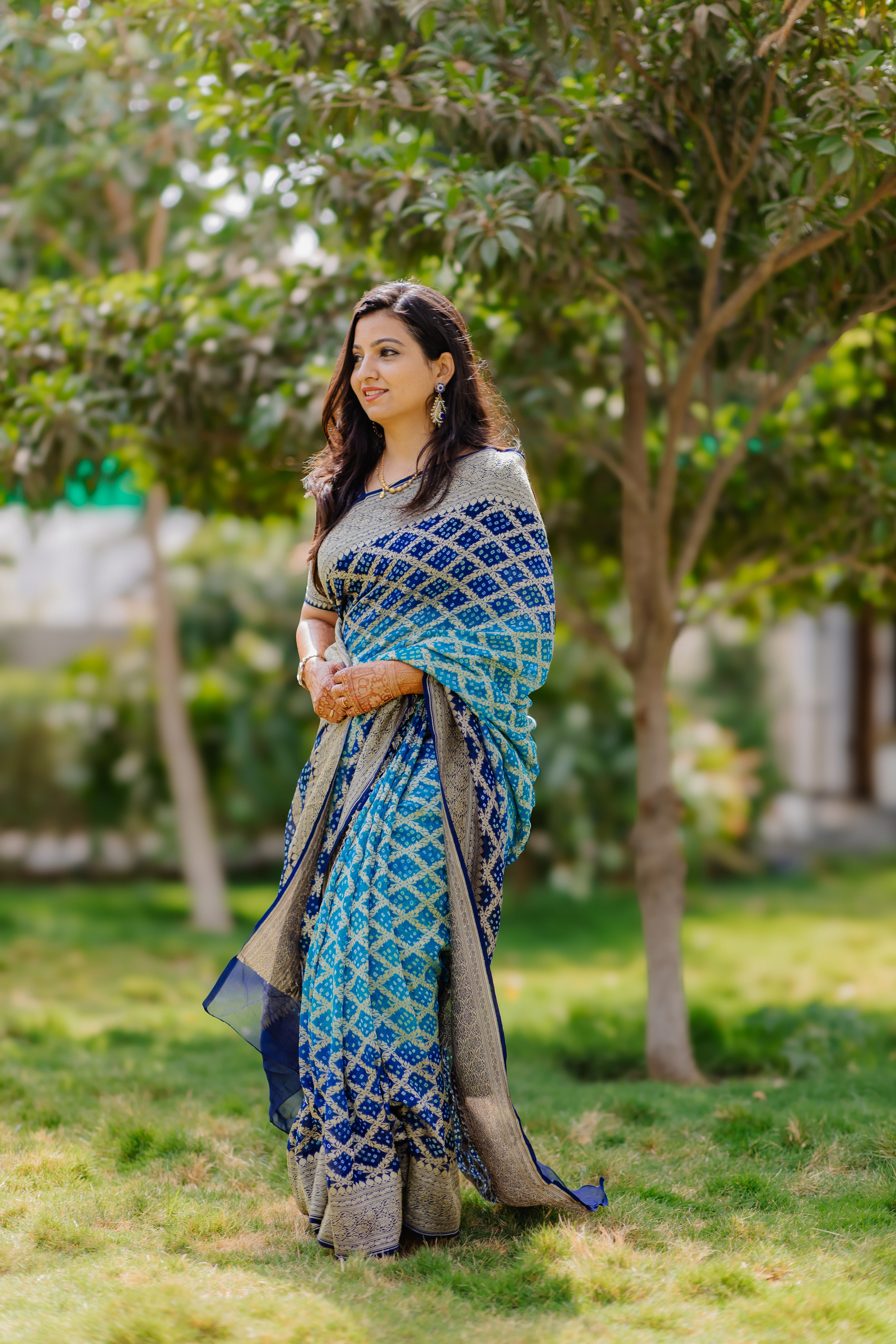 Elegant Woman in Traditional Blue Sari Outdoors · Free Stock Photo
