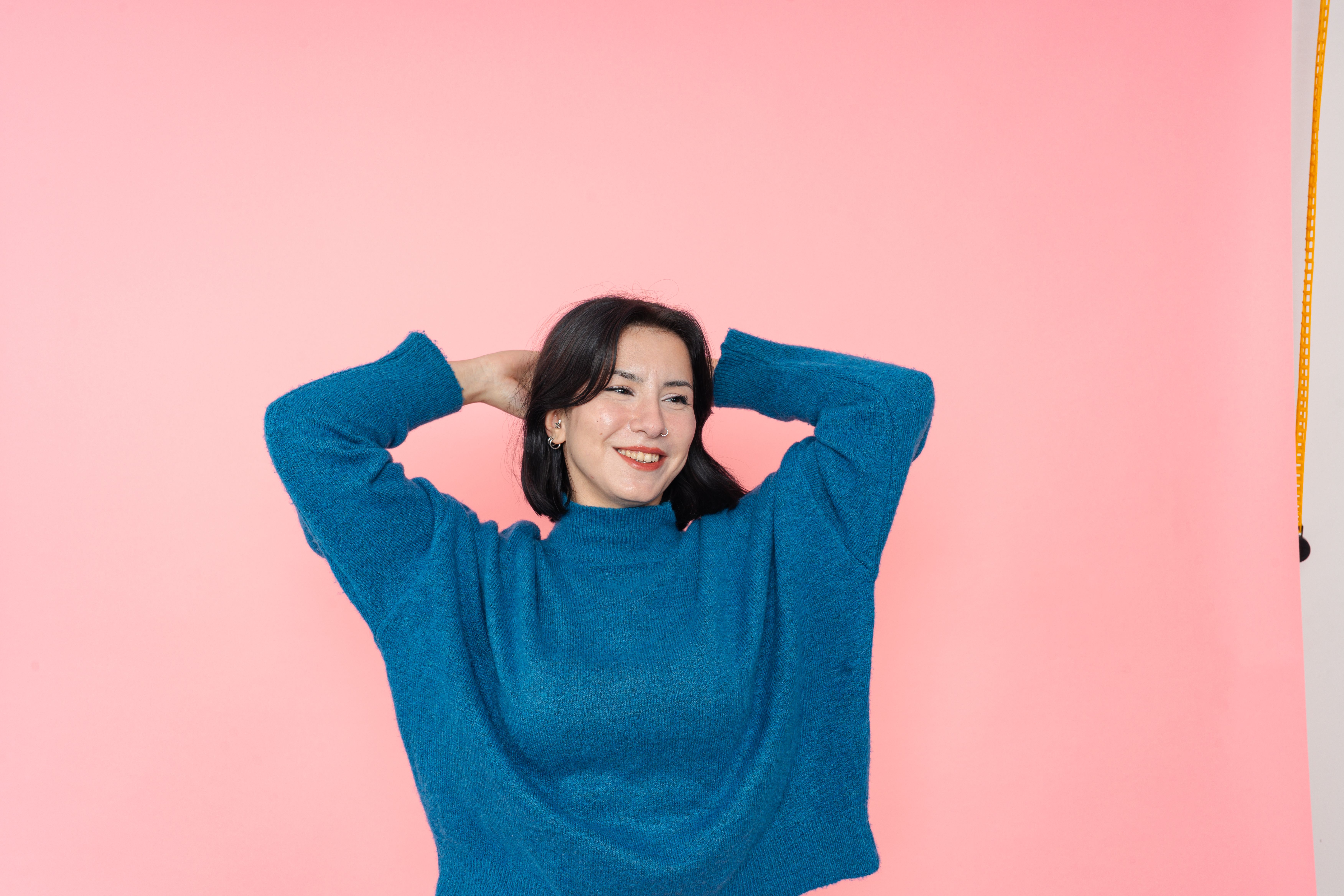 Royal blue turtleneck with black trousers