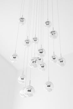 Elegant minimalist design featuring a modern glass orb light fixture with a bright aesthetic.