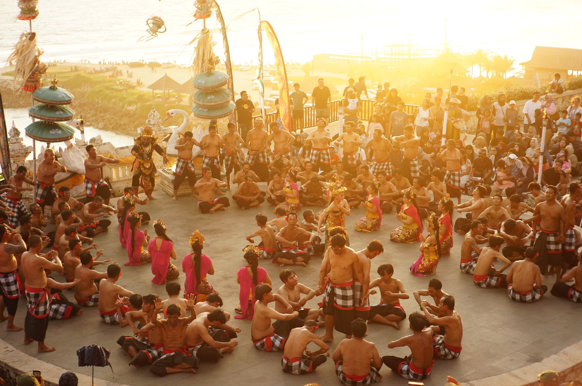Captivating Kecak dance performance in Bali, showcasing traditional costumes at stunning sunset.