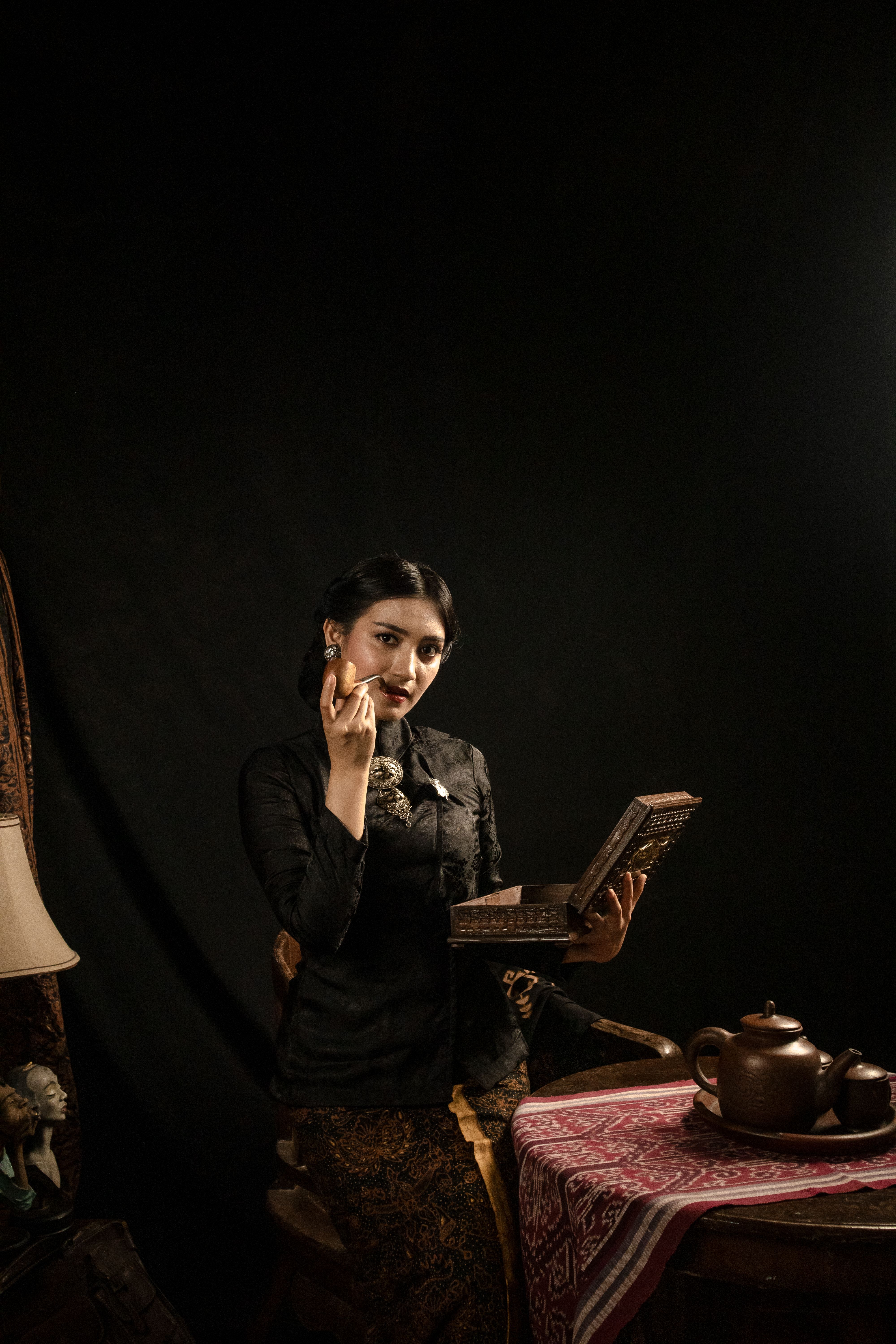 Traditional Woman with Makeup and Teapot · Free Stock Photo