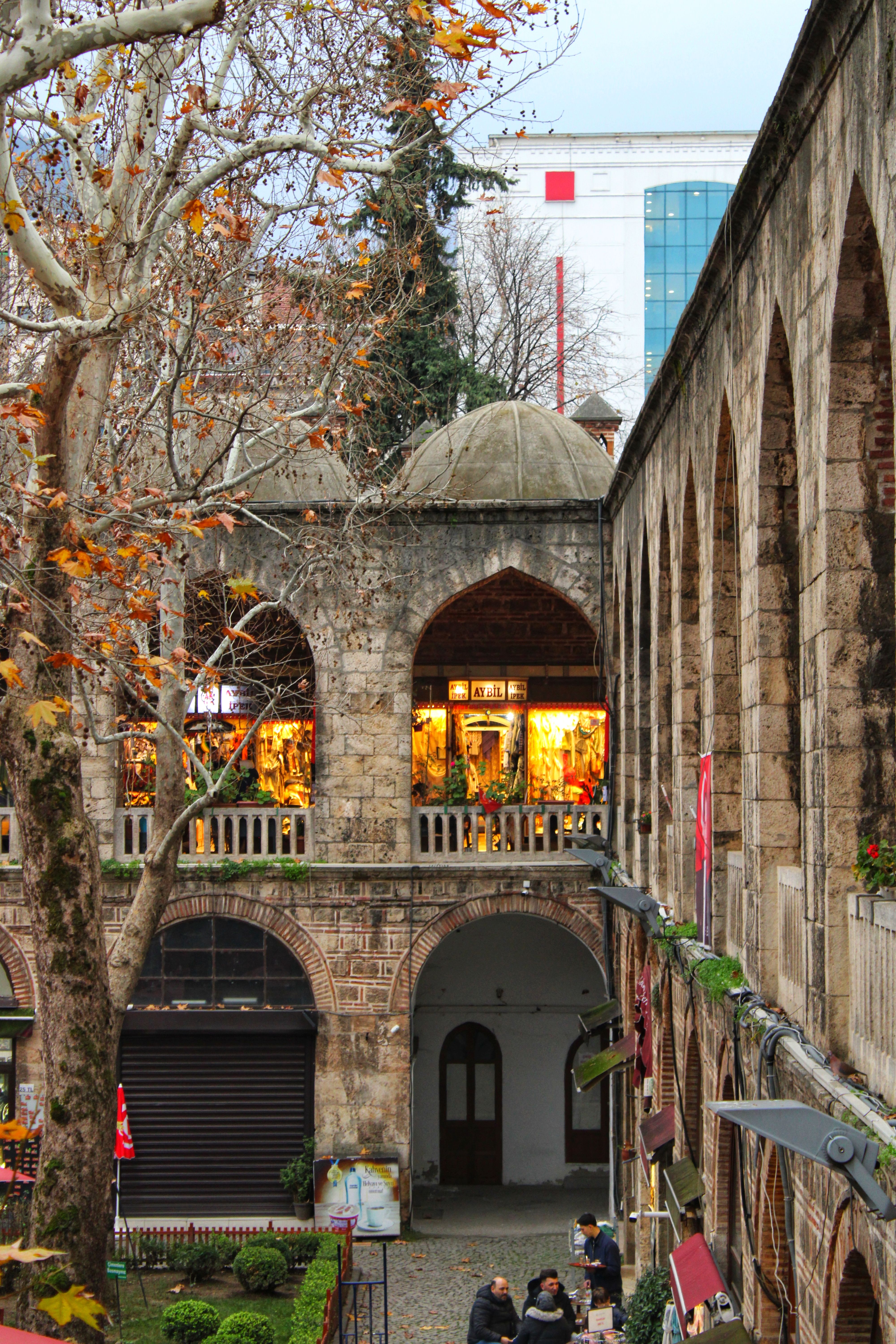 Discover the charm of an ancient Ottoman bazaar with warm stone arches.